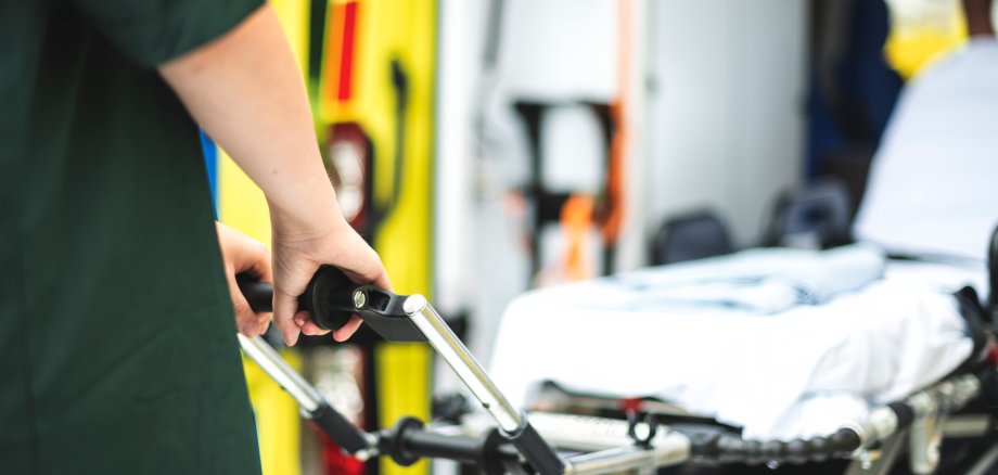 Paramedics at work with an ambulance