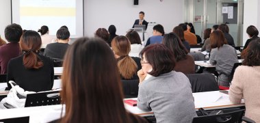 Seminargruppe bei Schulung